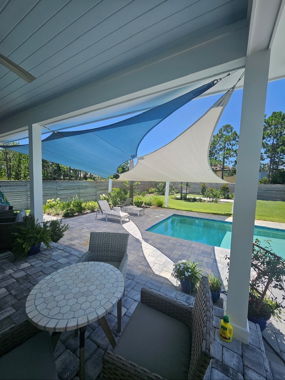 Shade Sails vs. Electronic Awnings: Which Is Best for Your Florida Outdoor Space with WECANSHADEIT serving Northwest Florida