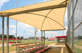 Shade Sails over sports arena in Panama City commercial & residential outdoor spaces | We Can Shade It services Pensacola, Destin, Fort Walton Beach, 30a, Panama City Beach, Panama City, Mexico Beach, Tallahassee and all surrounding cities with Shade Sail Designs & Installation, Artifcial lawns & turf pads, sports netting, safety features & more.